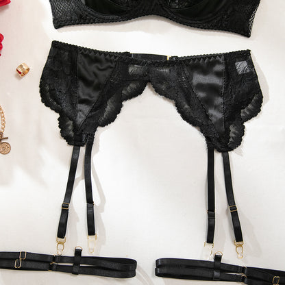 Three-piece lingerie set styled with sheer mesh