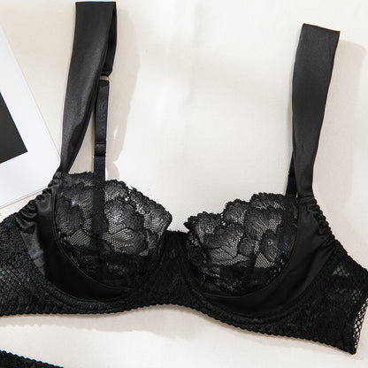 Lace accents on black three-piece lingerie set
