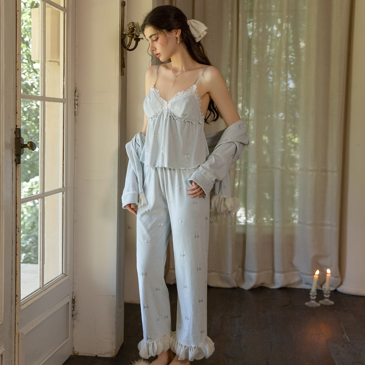 Light blue cami and pajama pants styled with the matching cardigan off the shoulders