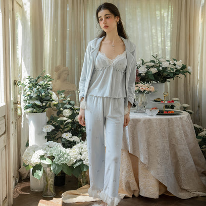 Front view of the light blue floral pajama set with lace cami, pants and cardigan