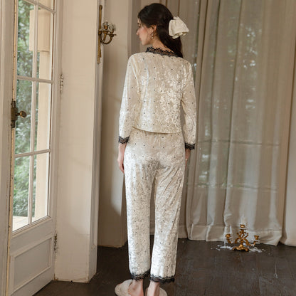 Back view of the light yellow long-sleeve cardigan and matching pajama pants