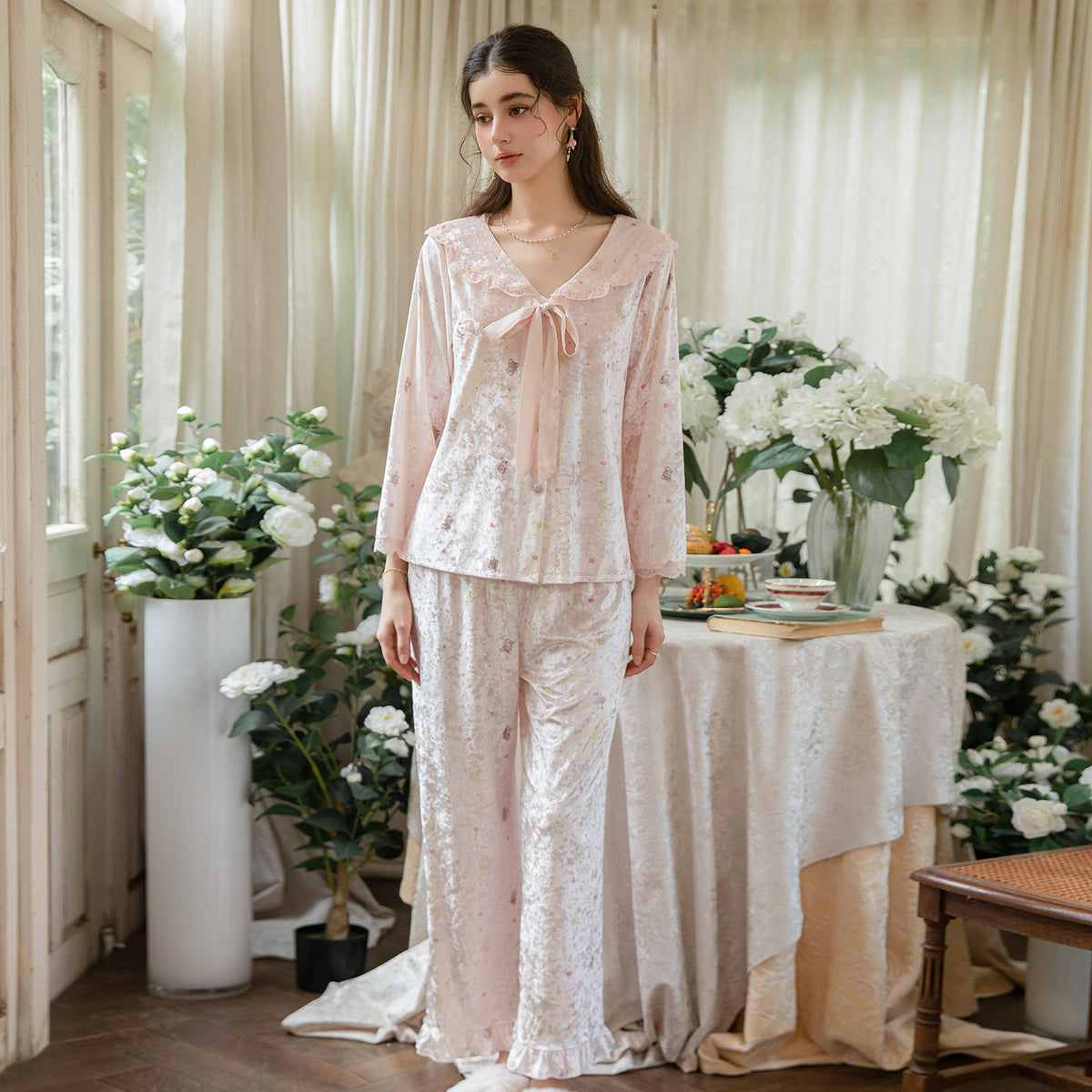 Pink pajama set with ruffle sleeve detail