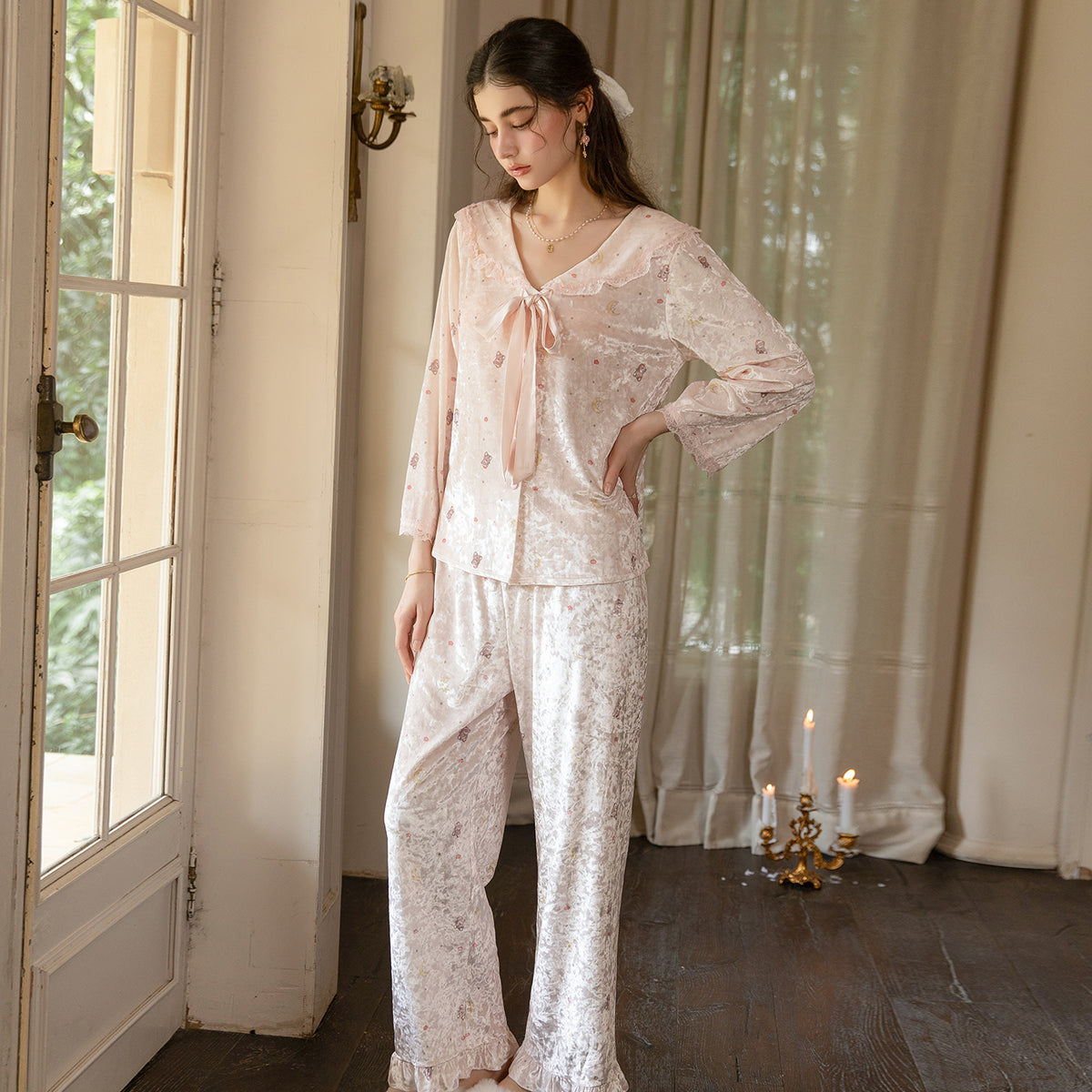 Pink ruffle trim pajama set angled view
