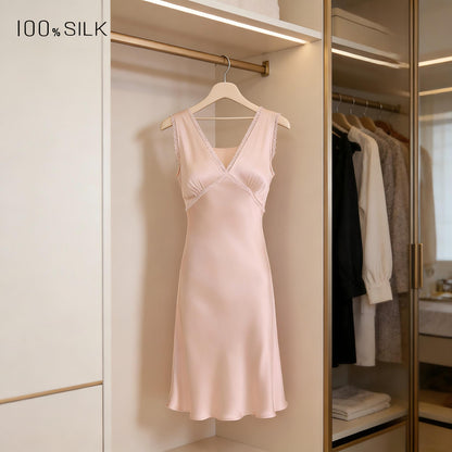Pink silk nightgown displayed in wardrobe
