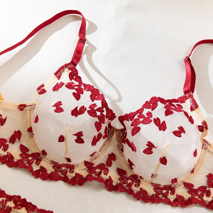 Three-piece lingerie set featuring garter straps