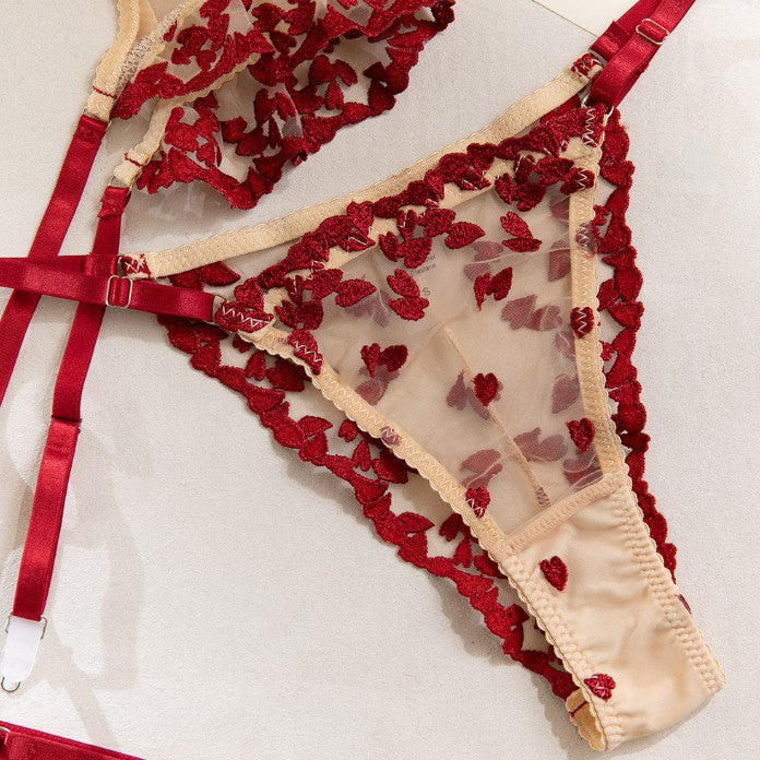 Garter straps accents on three-piece lingerie set