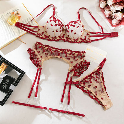 Garter straps accents on three-piece lingerie set